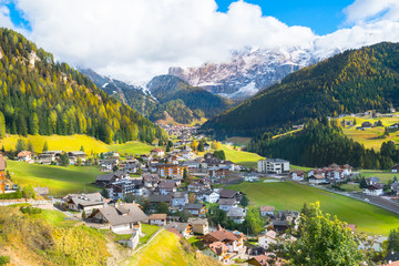 Santa Cristina Valgardena, Italy - October, 20, 2016 - Is the second village in the beautiful Val gardena valley in the heart of the huge dolomite mountains. - obrazy, fototapety, plakaty