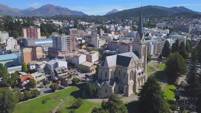 Aerial view of the town of Bariloche with Cathedral of Our Lady of Nahuel Huapi and the lake of Nahuel Huapi. Patagonia, Argentina