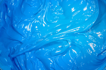 close up light blue color of oil paint.ink of screen printing  for print on tee shirts and fabric