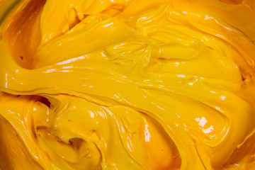 close up yellow color of oil paint. ink of screen printing  for print on tee shirts and fabric