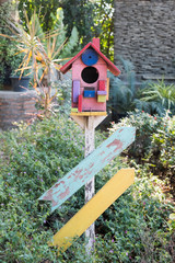 Bird house in a park.
