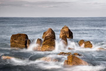 waves crashing on the rocks