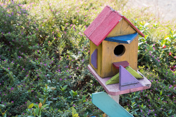 Bird house in a park.