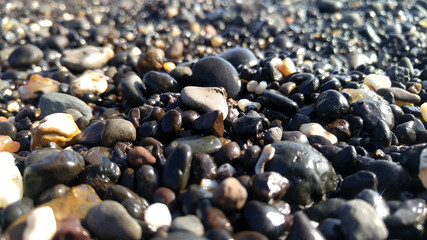 natural black pebble on beach