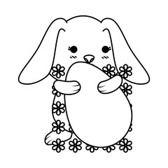 cute rabbit with easter egg painted and flowers