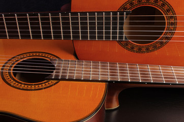 Obraz na płótnie Canvas Two acoustic guitars. Close-up