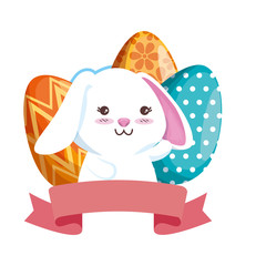cute rabbit with easter eggs painted