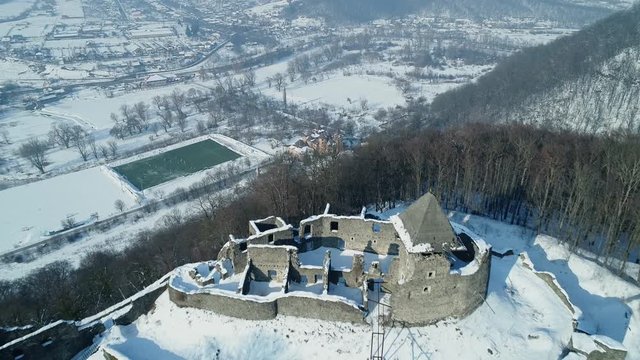 Aerial view: Incredible winter view of the ruins of an ancient castle Nevitsky castle, HD