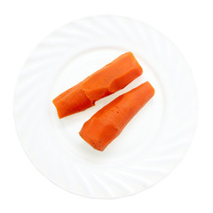 Boiled carrots in a plate on a white background