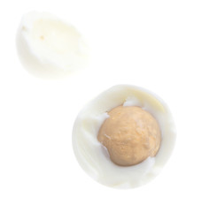 Peeled boiled egg isolated on white background
