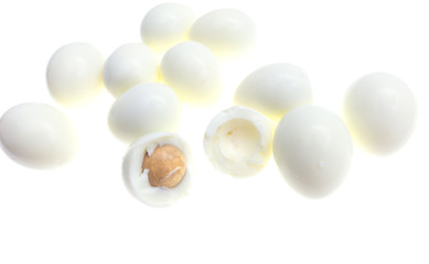 Peeled boiled eggs on a white background