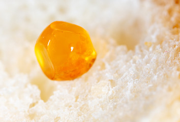 Red caviar on bread as a background