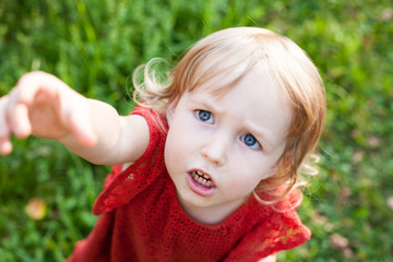 little child caucasian girl anxious face closeup