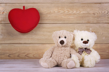 Couple Teddy Bears with heart. Valentines Day background.