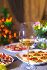 glass of white wine on a table