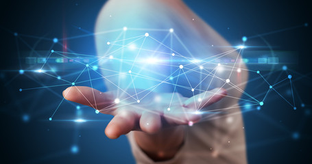 Handsome person holding hologram screen displaying modern cloud based web system technology
