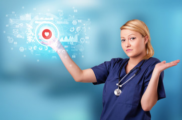 Doctor touching hologram screen displaying medical symbols and charts
