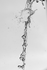 Raindrops flying from the roof