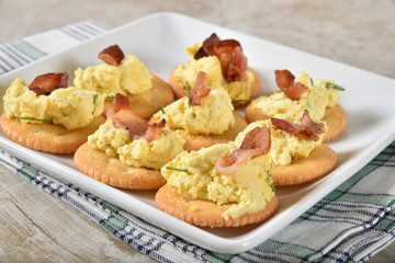 Deviled egg and bacon snack