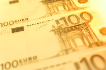 Closeup view of cash money euro bills background. Finance and business theme. Shallow depth of field
