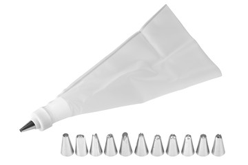 Piping bag for whipped cream frosting with several tips. Cupcake decorating tools, icing bag and...