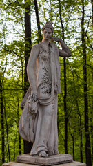 Fototapeta premium Ancient statue in the park