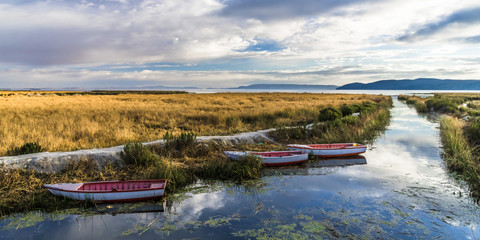 Three boats in the lake channel