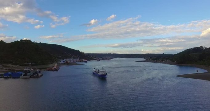 Aerial view with drone of a wellboat sailing on the Tenglo channel, in the city of Puerto Montt