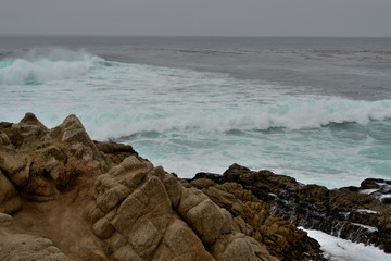 Seascape along the 17 Mile Drive in overcast day. California, USA