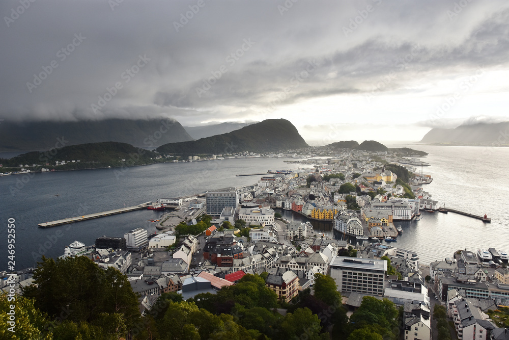 Poster Panoramic view of the archipelago, the beautiful Alesund town centre and the amazing Sunnmore Alps from Fjellstua  Viewpoint, More og Romsdal, Norway