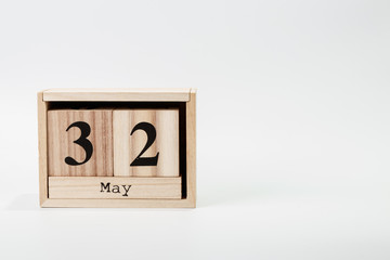 Wooden calendar May 32 on a white background
