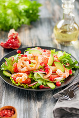 Salad with prawns, grapefruit,  cucumber