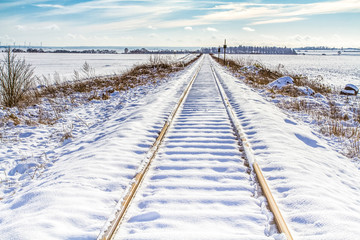 rail sous la neige