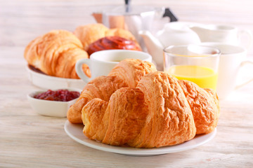 Breakfast, with croissant, juice and coffee