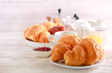 Breakfast, with croissant, juice and coffee