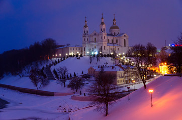 Obraz premium Holy Dormition Cathedral on Uspenskaya mountain above Western Dvina, evening winter landscape, Vitebsk, Belarus