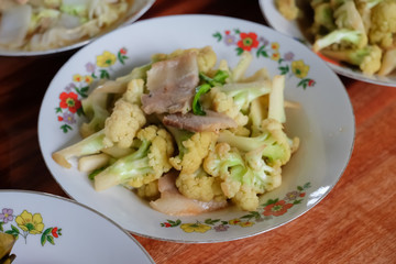 Stir Fry Cauliflower with Oyster Sauce Recipe on a plate for Chinese new year, Chinese Ghost Festival.