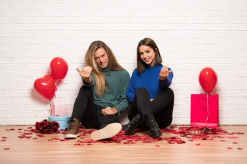 Couple in valentine day inviting to come with hand