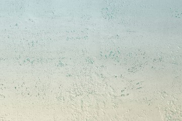 Obraz premium beautiful shabby light blue travertine like plaster texture for any purposes.
