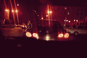Night view of the cars. The traffic jam . The traffic jam on the road in the city at the night with yellow and red electrical light for cars during they are coming home.