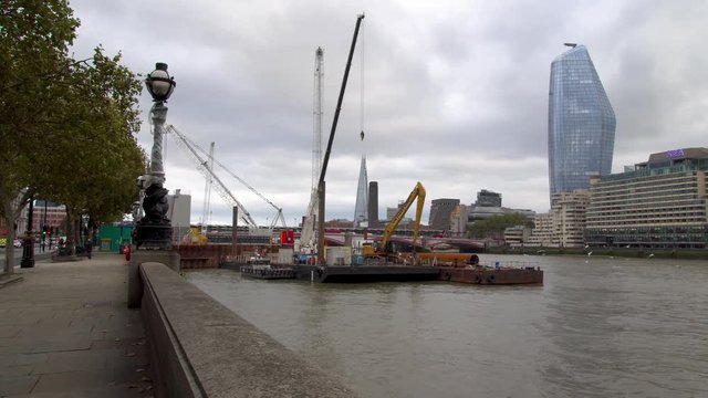 Day time London Victoria Embankment, crane work, repairs