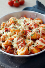gnocchi di papate gratinati con pomodoro e formaggio fuso