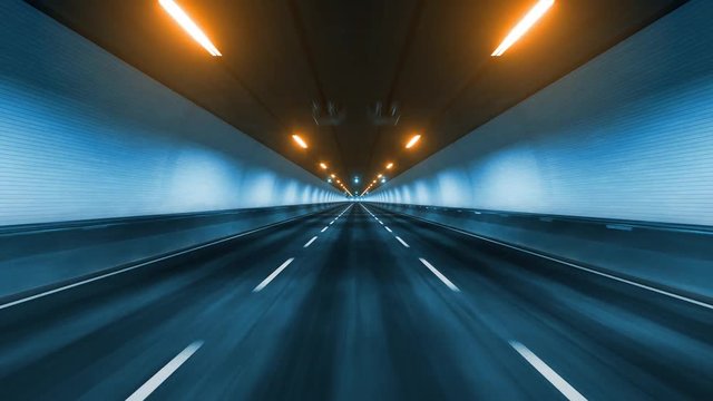 Travel through the illuminated tunnel with motion blur