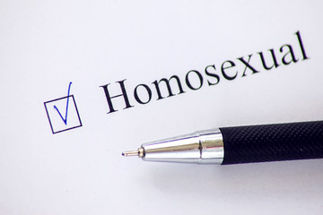 Checklist with a word Heterosexual on white paper. Checkbox concept.