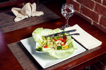 Finished plate and cutlery at restaurant table. Food and restaurant concept