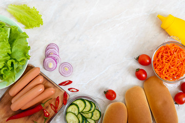 Ingredients for cooking hotdog on the kitchen table. Top view, flat lay. Fast food. Street food.