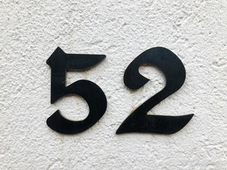 The number of street address with number 52 closeup