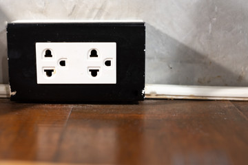 Electrical switch and plug on wall