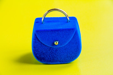 blue small suitcase on the zhmet background