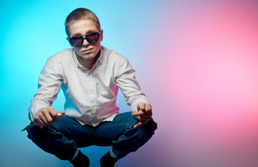 crazy man with glasses and a white shirt with a knife in his hand. gangster on the area. ghetto...